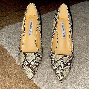 Never worn snake skin heels. OFFERS ACCEPTED